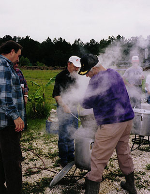 Marc Savoy oversees the crawfish boiling process.